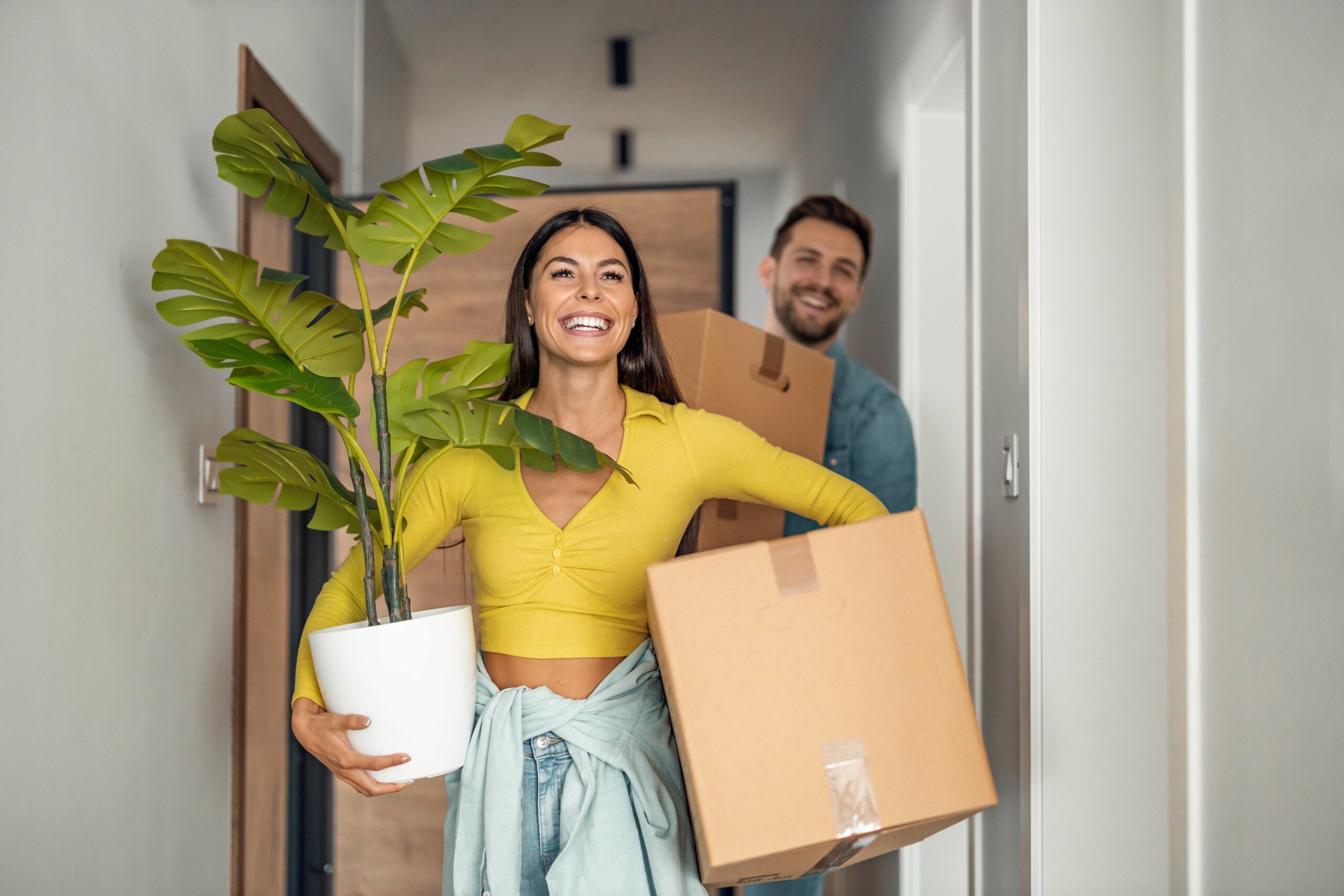 Selling your home before buying your next property. Young couple moving home.